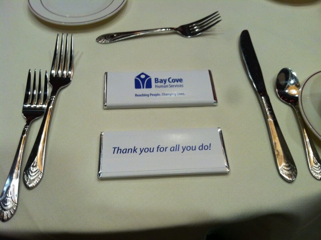 behind the scenes content to engage the audience- a choclate at a gala event place setting